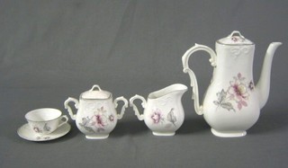 A 25 piece Continental porcelain coffee service comprising coffee pot, cream jug, 12 saucers, 12 cups