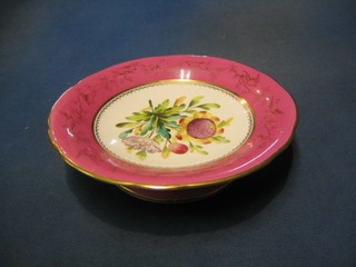A 19th Century dessert service with pink and gilt banding and floral decoration comprising a comport and 2 plates and 4 Newell Pottery humerous plates