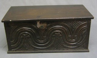 An antique carved oak bible box with hinged lid 24"