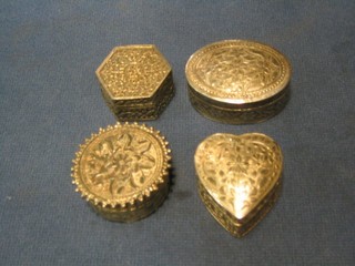 An oval engraved silver trinket box 2", a heart shaped ditto 1 1/2", an octagonal ditto 1 1/2" and a circular ditto 1"