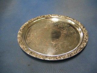 A circular engraved silver plated salver  10"