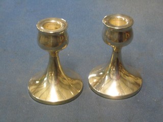 A pair of plain silver stub shaped candlesticks 4", Birmingham 1959