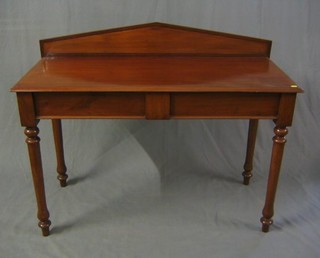 A Victorian mahogany hall table with raised back and fitted a frieze drawer,  on turned supports 48"
