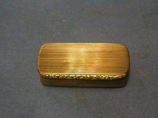 A 19th Century reeded gilt metal snuff box with hinged lid 3"