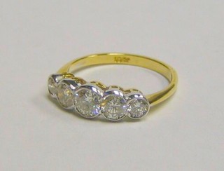 A lady's 18ct yellow gold dress/engagement ring set 5 diamonds (approx 1.10ct)