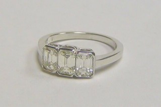A lady's 18ct white gold dress/engagement ring set 3 baguette cut diamonds (approx 1.53ct)