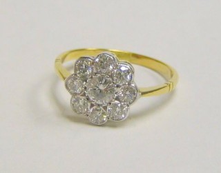 A lady's 18ct yellow gold cluster dress ring set 9 diamonds (approx 0.90ct)