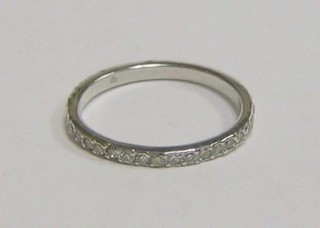 A lady's 18ct white gold eternity ring set diamonds