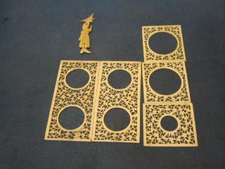 A 19th Century Dutch ivory pipe cleaner in the form of a standing priest 3" and 5 pierced ivory miniature mounts 4" and 2"