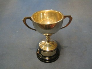 A silver twin handled trophy cup, Birmingham 1957 2 ozs