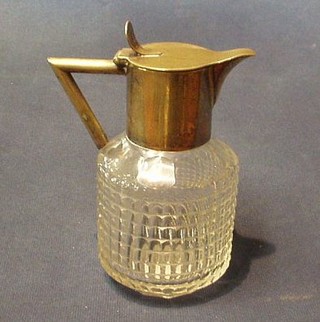 A cut glass whiskey decanter with silver plated mounts in the Dresser manner, marked K & CO N, 6" high