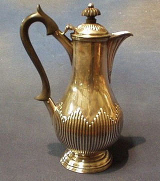 A Queen Anne style silver plated hotwater jug with demi-reeded decoration