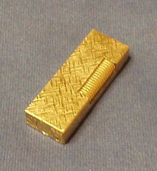 A Dunhill gold plated gas cigarette lighter