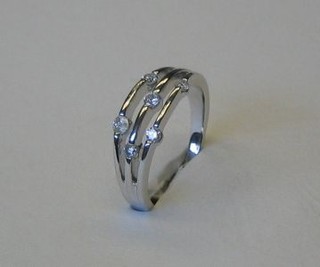A lady's modern 18ct 3 band white gold dress ring set 6 diamonds