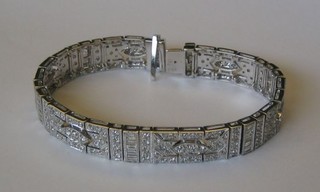 A lady's handsome Art Deco style 18ct white gold bracelet set numerous diamonds