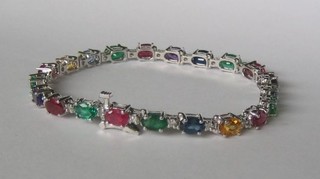 A lady's 14ct white gold bracelet set rubies, saphires, emeralds, amethysts etc (set 21 stones)