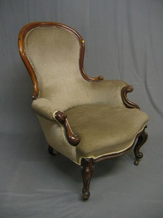 A Victorian show frame mahogany spoon back chair, raised on cabriole supports
