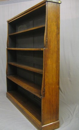 A 19th Century rosewood bookcase the upper section with pierced brass three-quarter gallery fitted 5 adjustable shelves, raised on a platform base 55"