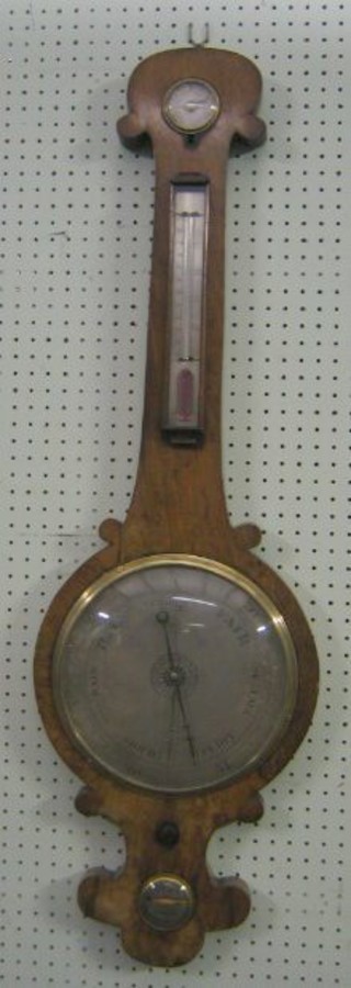 An 18th Century mercury wheel barometer and thermometer with damp/dry indicator, thermometer, 10" circular dial and spirit level, contained in a bleached walnut case by W Toner of London