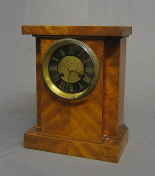 A Victorian French 8 day striking mantel clock with black and gilt dial and Roman numerals, contained in a walnut break front case 10"