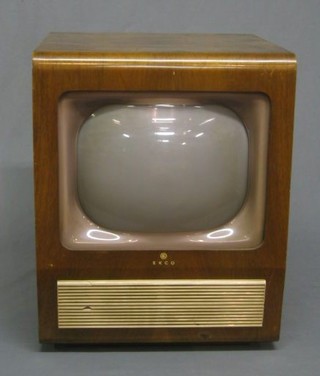 An Ecko Vision Type TU211 12" black and white television, contained in a walnutwood case