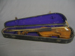 A violin with 2 piece back 12" contained in a wooden case