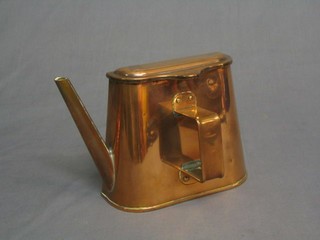 A curious rectangular copper kettle