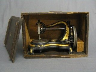 A 19th Century Jones Hand Machine sewing machine of serpentine outline, cased