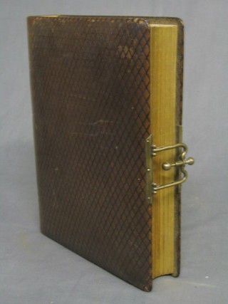 A Victorian leather bound family photograph album