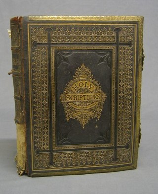 A leather and metal bound Holy bible (requires attention)