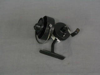 A Mitchel 305 Cap multiplying fishing reel