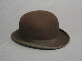 A brown Derby hat by Lock & Co (approx size 7)