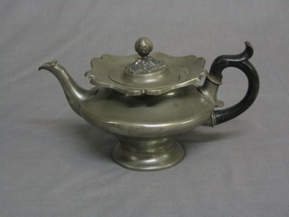 A 19th Century shaped pewter teapot, the base marked Broadhead & Atkin