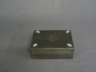 An Art Nouveau planished pewter trinket box, the corners set cabouchon cut turquoises 8" (hinge f)