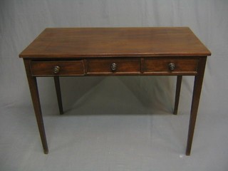 A 19th Century mahogany side table, fitted 3 short drawers and raised on square tapering supports 42"