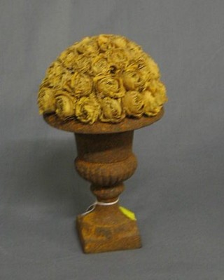 A miniature reproduction iron urn with dried flowers 5"