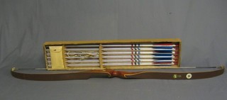 A Polar Bear cross power Grisley bow, together with 12 arrows marked Sanfransisco Archery Shop