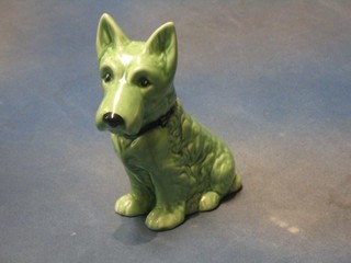 A green glazed Sylvac figure of a seated dog, the base marked 1207 Sylvac RD NO. 778504, 5" 