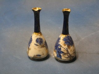 A pair of 19th Century Flo Bleu porcelain specimen vases of club form 7"