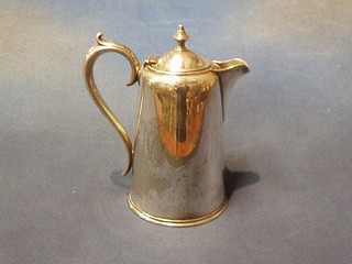 An engraved silver plated hotelware hotwater jug, base marked Victorian Station London