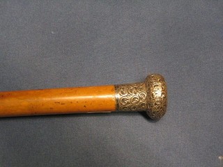 A gentleman's Victorian evening cane with embossed silver  handle, London 1859