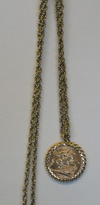 2 gilt metal chains 1 hung a gold pendant inset a Queen Elizabeth II 1978 sovereign