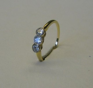 A lady's 18ct gold dress ring set 3 diamonds