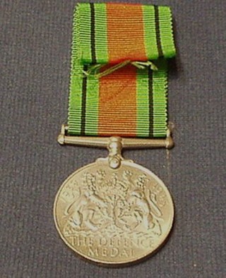 A Defence medal, boxed