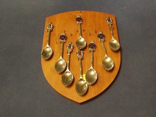 5 silver plated and enamel Trogan Rifle Club teaspoons and 4 other Civil Service Rifle Association tea spoons?