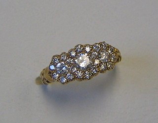 A lady's 18ct yellow gold triple cluster design dress ring set numerous diamonds (approx 0.68ct)