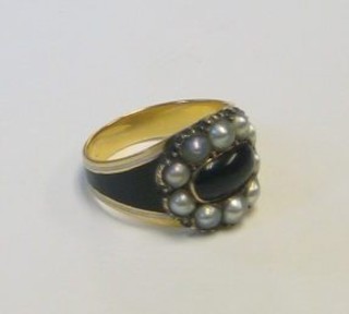 A Victorian gold, black enamelled and demi-pearl mourning ring, the reverse engraved Lord Brownlow died 25 December 1807 aged 60