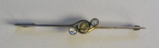 A bar brooch set white stones