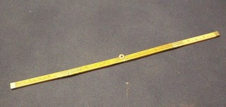 A 19th Century folding "13m" rule by the Army & Navy London 12"