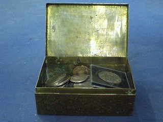 A Victorian Benares brass box containing a Victorian 1893 and a ditto 1895 crown, a George V 1935 crown and other coins